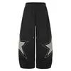 Pantalones de chándal de retazos con estampado de estrellas en color burdeos para hombre con cintura con cordón, estilo callejero americano, pantalones casuales holgados de pierna ancha para hombres y mujeres
