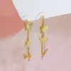 Pendientes de borlas de mariposa de moda, estilo largo, estilo de lujo ligero, efecto adelgazante, colgantes de borla con gancho para la oreja, pendientes compactos al por mayor