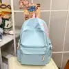 Mochila de Colores Bloqueados con Letras de Nuevo Estilo Simple Estilo Bosque Versátil Transfronteriza Moda Ins Mochila de Gran Capacidad Bolsa Escolar para Viajes