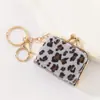2026 Novo Estilo de Pingente Inspirado em Chanel Estampa de Leopardo Crina de Cavalo Pu Bolsa Pingente Design Unissex Acessório de Moda