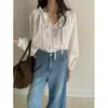 Enviado. Camisa chic de estilo coreano, versátil y moderna, de un solo botón, que se puede usar de dos maneras diferentes, top suelto y casual para mujer, 25475