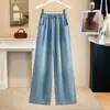 Foto real de pantalones de mezclilla Tencel de color claro talla grande para mujer, estilo de verano fino, frescos al tacto, cintura elástica, corte holgado, con caída, pantalones largos hasta el suelo para mujer