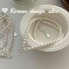 Blogger surcoreana con collar de plata de ley S925 con perla Swarovsky, doble lazo hueco, temperamento