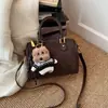 Nova Bolsa Versátil Estampada Retrô Feminina de Ombro e Mão 2025 Bolsa Almofada Moda Outono e Inverno Bolsa Transversal para o Dia a Dia