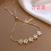 Pulsera Flor de Circonita Chapada en Oro Real Nicho Dulce Versátil Pulsera Temperamento Lujo Ligero Joyería de Gama Alta para Mujeres Al Por Mayor