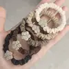 Nuevo Anillo de Intestino Grueso de Alta Elasticidad para Adulto Cuerda para el Cabello Cola de Caballo Alta Estuche de Cuero Anillo de Intestino Delgado Cuerda para la Cabeza Popular Simple Retro Goma