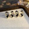 Pendientes de plata con luz de aguja, de lujo, de circonita negra de alta gama, con un toque de amor, pendientes geométricos de temperamento nicho, con un diseño único y sentido del humor.