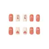 Modelo Más Vendido de Comercio Exterior: Uñas Postizas Rectangulares de Longitud Media, 24 Piezas, Diseño de Hoja Naranja Cálida con Forma de Corazón para Otoño e Invierno, Suaves y Dulces, Venta al por Mayor