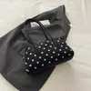 Bolsa tipo almohada 2026 de un solo hombro para debajo del brazo, bolsa coreana de lunares nuevo estilo para mujer, linda niche pequeña bolso de mano transfronterizo