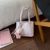 Bolso estampado de nicho súper popular para mujer, nuevo bolso cruzado versátil de moda 2026, minibolso exquisito, bolso tipo cubo