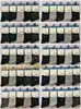 Calcetines de media pantorrilla antibacterianos y resistentes al olor para hombre, hechos de 100% algodón, absorbentes, transpirables, adecuados para uso de negocios y casual, disponibles en negro, blanco y gris, con un diseño simple de letras, al por mayor