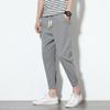 Pantalones casuales de algodón y lino 2023 para jóvenes hombres casuales simples pantalones atados al tobillo pantalones cortos ajustados pantalones cortos hombres venta al por mayor de fábrica