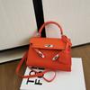 Bolso de mujer 2024, nuevo estilo coreano, moderno, portátil, bolso Kelly, bolso cruzado de hombro de alta gama que combina con todo.