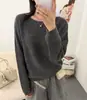 Tejido de punto con diseño calado y cuello redondo para mujer 2026 Otoño Nuevo Estilo holgado y casual Color liso Versátil Suéter fino