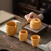 Seção Dourada Argila Roxa Bule de Chá Artesanal Relevo Minério Bruto Conjunto de Chá Kung Fu Caneca de Chá Dragão e Fênix de Alta Qualidade Bule Venda por Atacado
