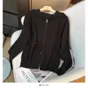 Cardigan Suéter Tricotado Solto com Capuz Novo Outono 2025 Feminino Zíper Duplo Manga Longa Versátil Jaqueta Top Cor Pura