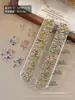 Caja de 12 compartimentos con diamantes de imitación para uñas de punta, populares, blancos brillantes y coloridos, decoraciones de uñas DIY, al por mayor
