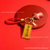 Producto popular de oro puro 999: Llavero "Palacio de Cham", un colgante creativo de campeón que garantiza el éxito en los exámenes, adecuado para estudiantes, hecho a medida y disponible para venta al por mayor