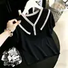 Top de encaje con cuello en V, manga corta con volantes, reductor de edad, para mamás, camiseta elegante que cubre el abdomen, Verano 2026