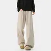 Pantalones de chándal anchos para hombre de color avena con estampado de espiga, cordón, dobladillo curvo, corte holgado y un estilo relajado hasta el suelo