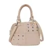 Bolso de mano coreano de nicho moderno con remaches para mujer, nuevo de otoño, retro, dulce, fresco, chica popular, bolso de hombro cruzado versátil