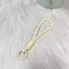 Cordón Versátil de Colores, Cordón para Teléfono Móvil, Correa de Muñeca Antiperdida para Cámara, Llavero de Muñeco de Peluche, Versión Corta Portátil