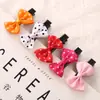 Comercio exterior más vendido para niños pasador pequeño lazo lunares pinza pico de pato bebé clip lateral para niñas accesorios para el cabello al por mayor