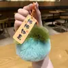 Suerte Colgante de Peluche de Caqui Llavero Adorno Caqui Suerte Colgante para Coche Adorno de Piel Sintética de Conejo Regalo