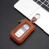 Nuevo estuche para llaves de pareja de cuero genuino gran capacidad Ventana de espejo para control remoto de coche de mujer estuche con cremallera para llaves retro exquisito