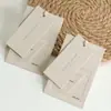 [Nuevo 2023] papel especial Tarjeta de incienso de arroz etiqueta de traje logo colgante cóncavo de presión estilo simple de lujo ligero ropa