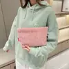 Bolso tipo sobre de textura de pana nuevo estilo 2026, Bolso de mano de tela de pana moderno y simple para mujer