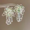 Flor de chifre com agulha de prata Flor com contas Laço de flor Brincos com borla redonda Brincos de tarraxa versáteis e elegantes Brincos de nicho de luxo leve
