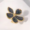 Anillo de Acero Inoxidable Francés Transfronterizo Retro Esmalte de Goteo Flor de Cinco Pétalos Nicho Femenino Alto Grado Exquisito Anillo de Acero de Titanio Joyería