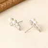 2025 Nuevo Clip para Oreja de Perla de Lujo Accesible Micro-Pavimentado con Circonita Pendientes de Moda Elegantes de Nicho para Mujer Pendientes Nuevos Personalizados