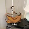 Versión Coreana Bolso de Mano Retro de Nicho Tipo Baguette para Mujer Invierno 2025 Nuevo Bolso de Hombro Único Cruzado Elegante de Alta Calidad