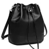 Bolso cubo de cuero de vaca de primera capa transfronterizo, bolso de mano de diseño de nicho de moda retro, bolso de hombro cruzado de alta gama, fabricantes