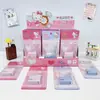 Yue Mu Serie de Caramelos de Leche Hello Kitty Mini Grapadora Portátil con Forma de Caramelo de Leche Cadena Colgante Grapadora Papelería para Estudiantes