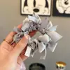 Goma para el pelo con lazo de satén estilo coreano para mujer 2026 Nuevo estilo Banda elástica para moño Cuerda elástica de alta elasticidad para coleta