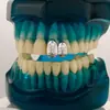 Amazon Transfronterizo Hip-Hop Conjunto Doble Relieve de Calavera Brackets de Diente de Oro Accesorios Dentales Electroplateados Auténticos Decoración Dental Falsa de Moda Personalizada para Mujeres