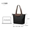 Bolsos de Mujer de Moda Transfronterizos 2026 Nuevo Estilo Bolso Sencillo Tipo Dumpling Bolso de Hombro Bolso Tote Gran Capacidad para el Trabajo y los Viajes Diarios
