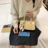 Bolsa Boston Ligera de Nailon Nuevo Verano 2026, Bolso de Mano para Mujer con Acabado de Alta Gama, Bolsa Grande de Hombro y Cruzada