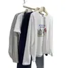 Nueva Camiseta de Algodón Puro de Manga Larga Estilo Hong Kong Súper Popular Otoño Moda Femenina Dulce y Picante Perezoso Interior Holgado Top Estampado