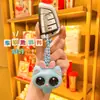 2026 Juguete de Apretar Creativo para Alivio del Estrés Gato con Ojos Saltones Llavero de Dibujos Animados Colgante para Mochila de Pareja para Hombres y Mujeres