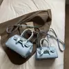 Bolso Platino de Gran Capacidad Bolso de Mujer Patrón Granulado Simple Elegante Bolso de Hombro Estilo Extranjero Versátil Cerradura Bolso Cruzado Portátil