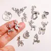 Accesorios para joyería DIY transfronterizos al por mayor colgantes vintage de renos navideños collares hechos a mano llaveros colgantes de aleación