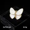 Broche hebilla anti-luz primavera y otoño suéter cárdigan fijo pin hebilla broche de mariposa de perlas venta al por mayor hebilla para bufanda de niña