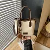 Bolso de mano vintage transfronterizo para mujer, nuevo bolso tipo cubo de moda otoño 2026, bolso de hombro cruzado casual para el trabajo
