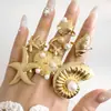 Anillo Set de Joyería Transfronteriza Europea y Americana Estilo Vacacional Estrella de Mar Perla Anillo Metálico de Concha Abierta Anillo de Dedo para Mujeres