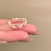 Anillo de corazón hueco estilo coreano para mujer, diseño único para apilar en el dedo índice, no se decolora y es extremadamente hermoso