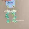 Pendientes de Borlas con Cuentas de Flores Coloridas Estilo Vacaciones de Verano, Dulce Estilo Bosque Nuevo Modelo 2026, Pendientes de Personalidad Frescos y Únicos